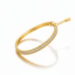 PULSERA ACERO DORADO ANCHA C/STRASS APUDI407D CAO