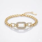 PULSERA ACERO DORADO CON DIJE BRONCE MICROPAVE APUDI563D CAO