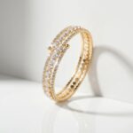 PULSERA FANT DORADO TRIPLE C/STRASS FLEX REG BZPU133D IAO