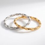 PULSERA FANTASIA DORADA Y PLATEADA ELASTICA FTAPU23 IAO