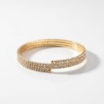 PULSERA FANTASIA DORADA TRIPLE STRASS FLEX BZPU131D IAO
